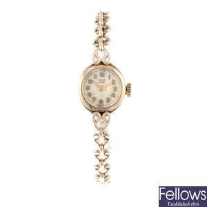 TUDOR - a lady's Royal 9ct yellow gold bracelet watch.