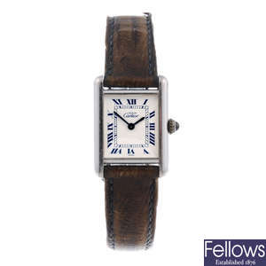 CARTIER - a silver Must De Cartier Tank wrist watch.
