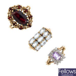 Five gem-set rings.