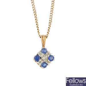 A sapphire and diamond pendant, with chain, and earrings.