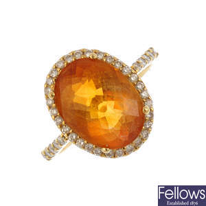 A citrine and diamond cluster ring.