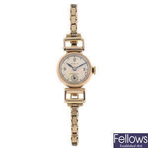 ROLEX - a lady's 9ct yellow gold bracelet watch.