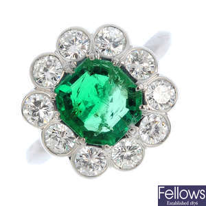 A mid 20th century emerald and diamond cluster ring.