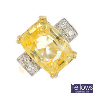 An 18ct gold yellow sapphire and diamond dress ring.