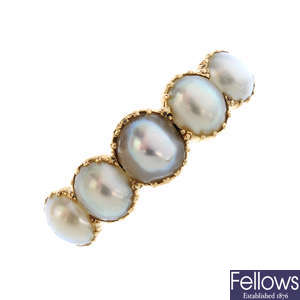 A split pearl five-stone ring.