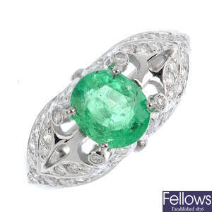 A platinum Colombian emerald and diamond dress ring.