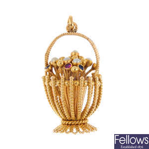 A gem-set floral basket charm