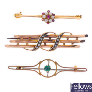 A selection of five early 20th century gold gem-set brooches.