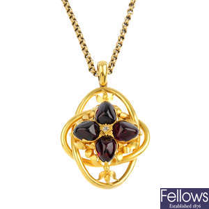 A late Victorian gold diamond and foil-back garnet pendant, with chain.