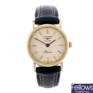 LONGINES - a lady's 9ct yellow gold  Presence wrist watch.