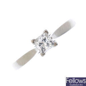 A palladium diamond single-stone ring.
