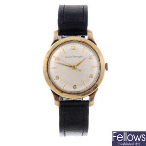 GIRARD-PERREGAUX - a gentleman's 9ct yellow gold wrist watch.