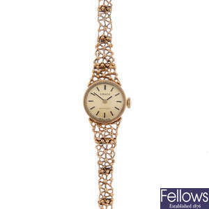 TISSOT - a lady's 9ct yellow gold Stylist bracelet watch.