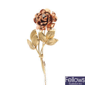 A 9ct gold diamond rose brooch.