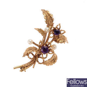A 9ct gold pearl and amethyst floral brooch.