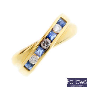 An 18ct gold sapphire and diamond crossover ring.