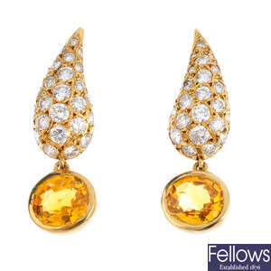 MOUAWAD - a pair of sapphire and diamond earrings.
