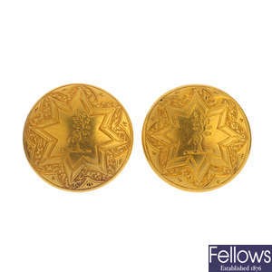 Two 1870s gold buttons.