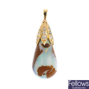 A boulder opal and diamond pendant.