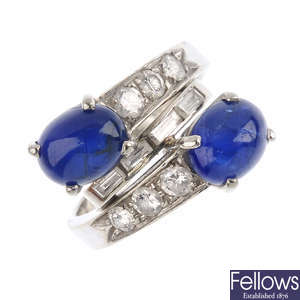 A diamond and sapphire crossover ring.