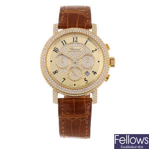 CHOPARD - a limited edition yellow metal factory diamond set 'Elton John AIDS Foundation' chronograph wrist watch.
