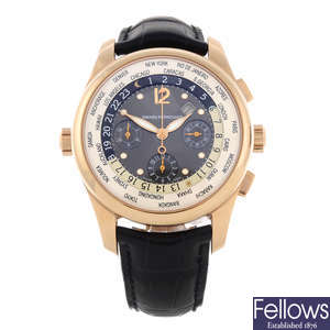 GIRARD-PERREGAUX - a gentleman's rose metal World Time chronograph wrist watch.