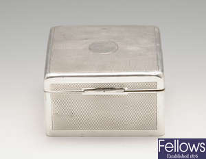 A late Victorian silver mounted table cigarette box & an early 20th century example. (2).