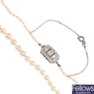 A natural pearl single-strand necklace, with Art Deco diamond clasp.