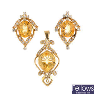 A citrine and diamond pendant, with a pair of matching earrings.