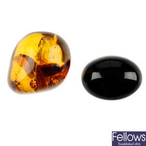 Two pieces of natural Dominican Republic amber with insect inclusions and a piece of simetite.