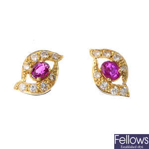 A pair of 18ct gold ruby and diamond ear studs.