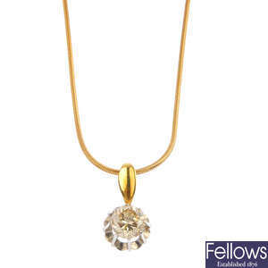 An 18ct gold diamond single-stone pendant, with 9ct gold chain.