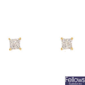 A pair of 18ct gold diamond stud earrings.