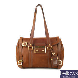 PRADA - a brown leather handbag.