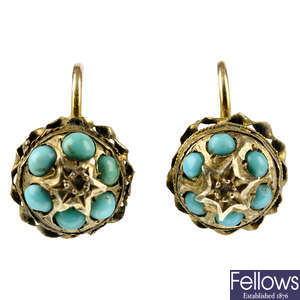A pair of early 20th century 9ct gold turquoise earrings.
