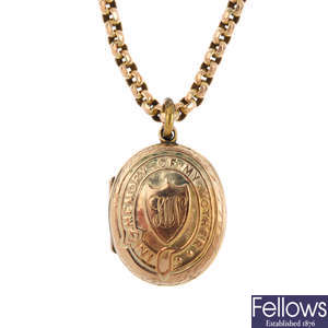 A back and front locket and chain.