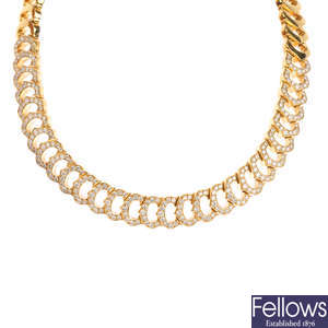 CARTIER - an 18ct gold diamond 'C Heart of Cartier' necklace.