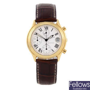 BAUME & MERCIER - a gentleman's yellow metal Baumatic chronograph wrist watch.
