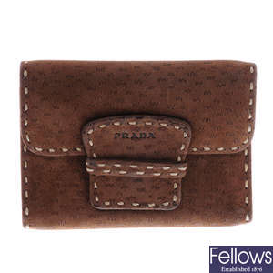 PRADA - a brown suede leather wallet.