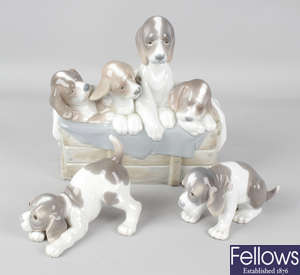 Three Lladro figurines modelled as dogs
