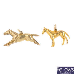 Two horse charms.