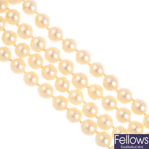 A cultured pearl two-strand necklace, with gem-set clasp.