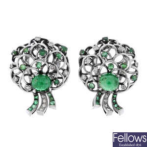 A pair of mid 20th century gold emerald and diamond earrings.