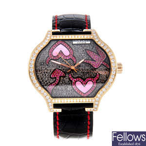 DELACOUR - a limited edition rose metal City Attitude 'Hell' wrist watch.