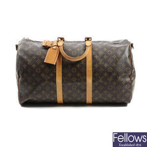 LOUIS VUITTON - a Keepall Bandouliere 50 luggage bag.