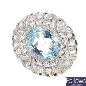 An early 20th century aquamarine and diamond dress ring.
