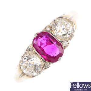 An early 20th century 18ct gold Burmese ruby and diamond three-stone ring.