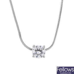 A diamond single-stone necklace.