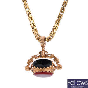 A 9ct gold chain with gem-set swivel fob.