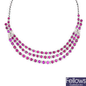 A ruby and diamond necklace.